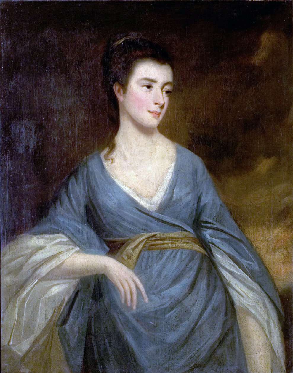 Giovane donna in un vestito blu da English School