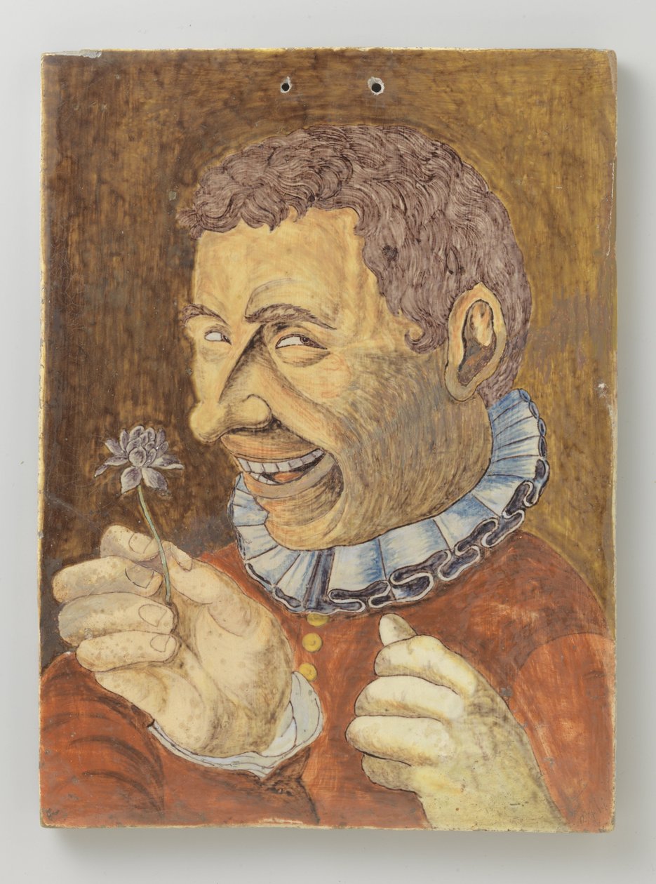 Placca di faience con uomo con fiore da Anonymous