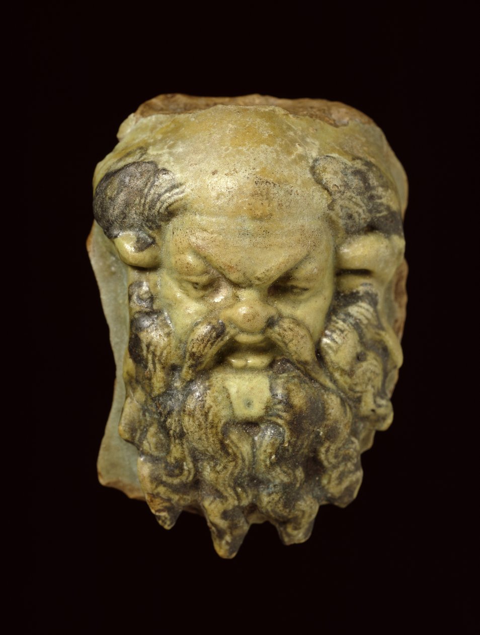 Testa di Sileno in faience smaltata da Egyptian Ptolemaic Period