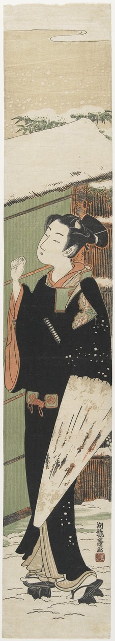 Giovane uomo a un cancello come un Mitate del dramma Kabuki Versione femminile dell