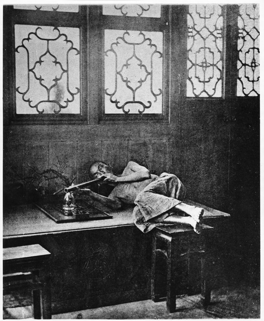 Fumatore di oppio da John Thomson