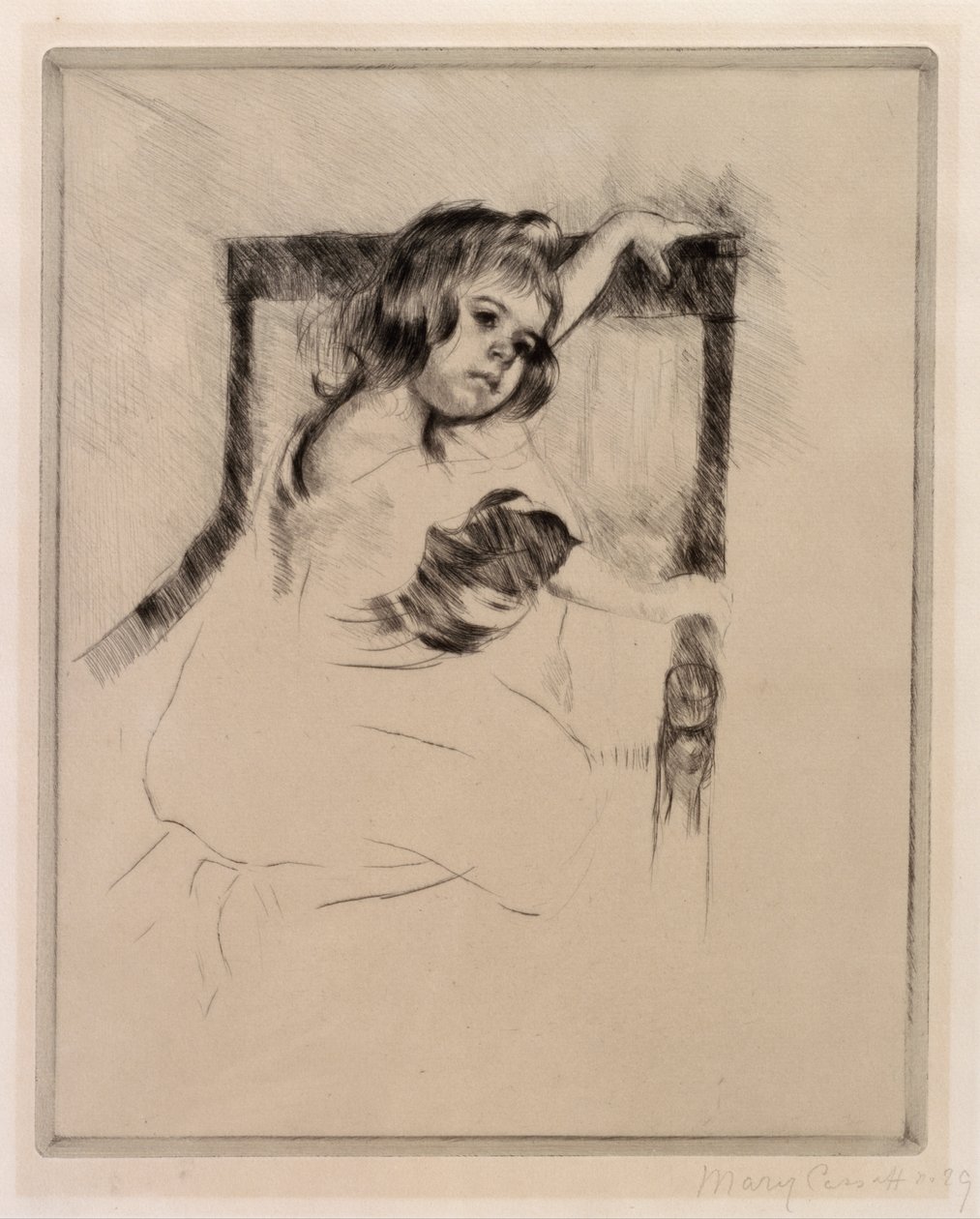In ginocchio su una poltrona da Mary Cassatt