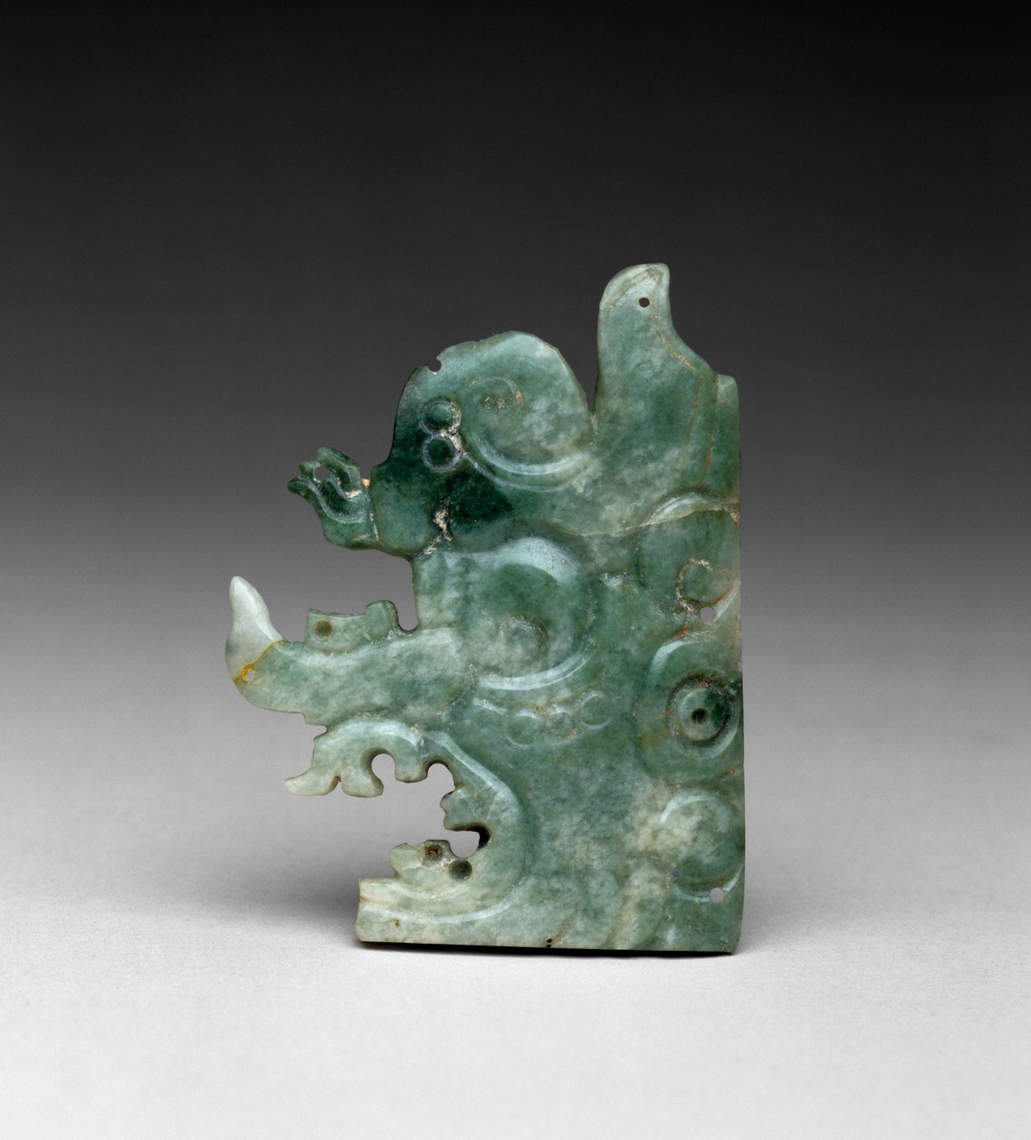 Ornamento per copricapo con la testa del dio giullare, Tardo Classico, 550-800 da Mayan