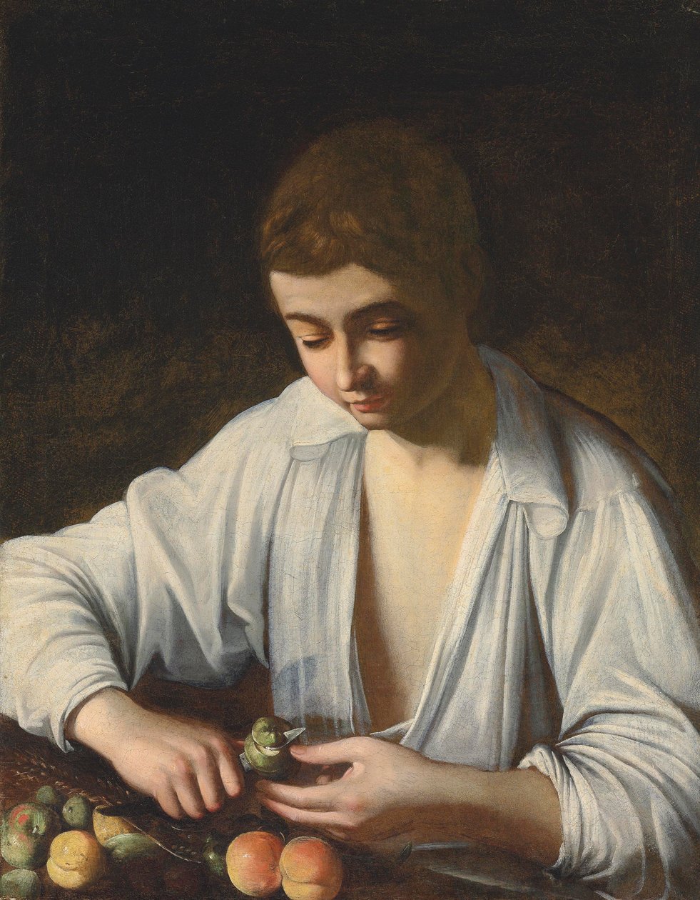 Un ragazzo che sbuccia la frutta da Michelangelo Merisi Caravaggio
