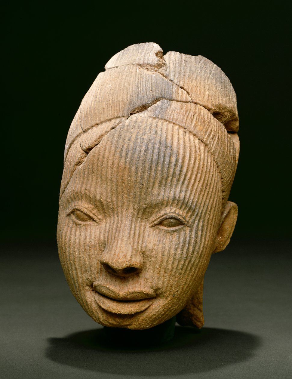 Testa da una figura, Owo da Nigerian