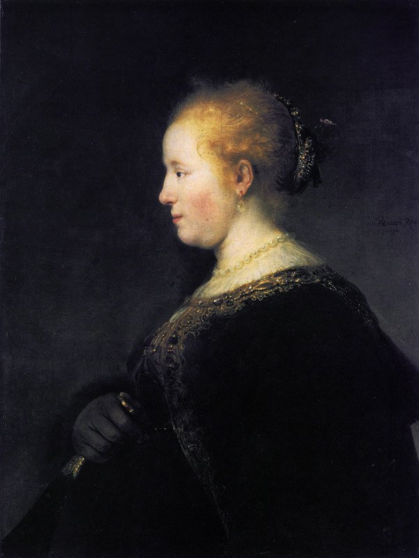 Una giovane donna di profilo con un ventaglio da Rembrandt van Rijn