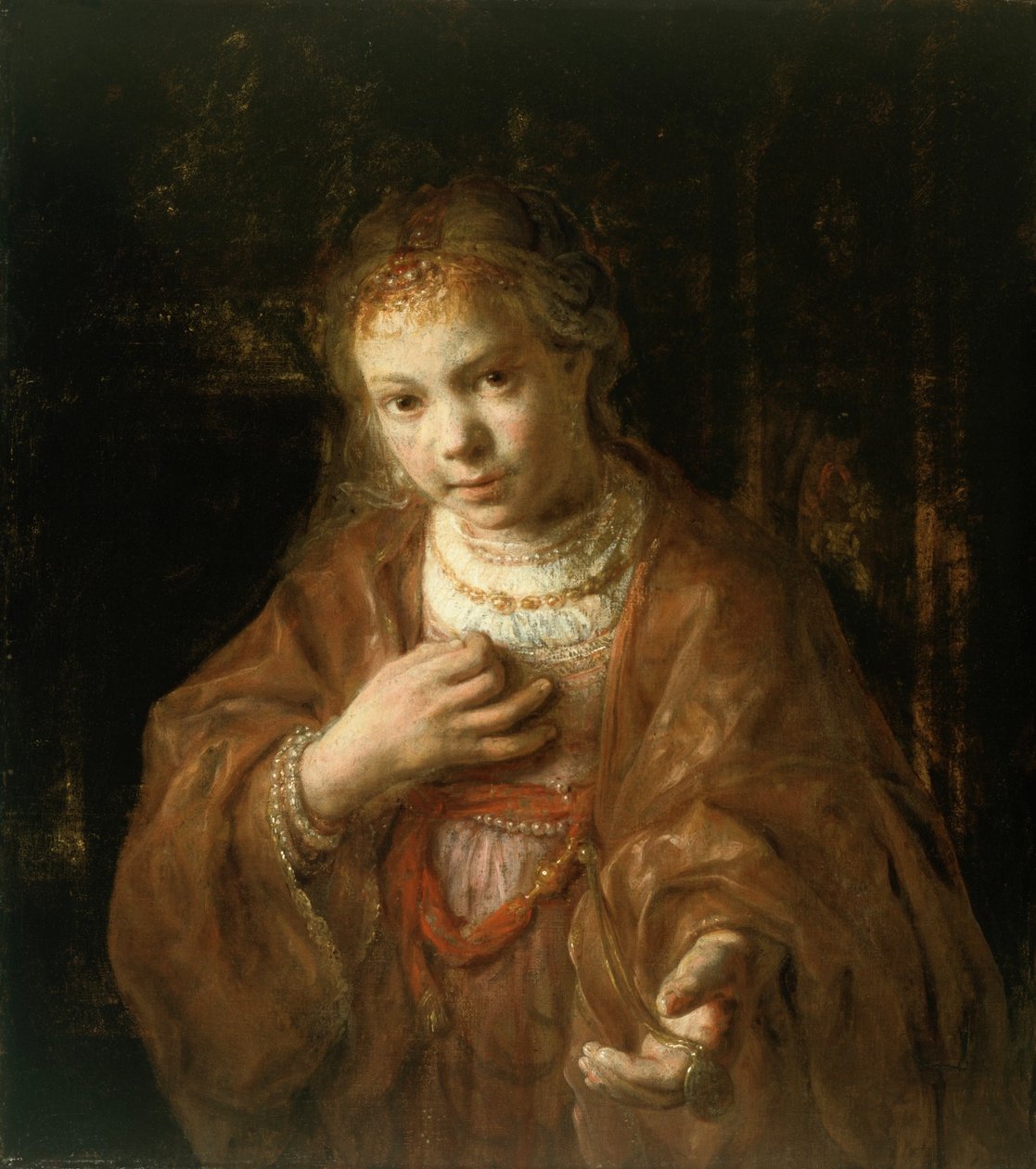 Giovane ragazza con in mano una medaglia da Rembrandt