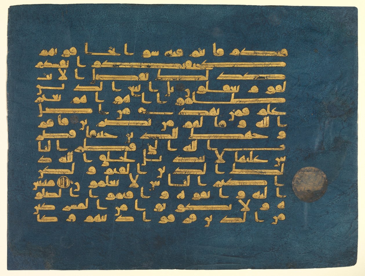 Foglio dal Corano Blu, realizzato in Tunisia, possibilmente Qairawan, seconda metà del IX secolo - metà del X secolo (oro e argento su pergamena tinta indaco) da Tunisian School Tunisian School