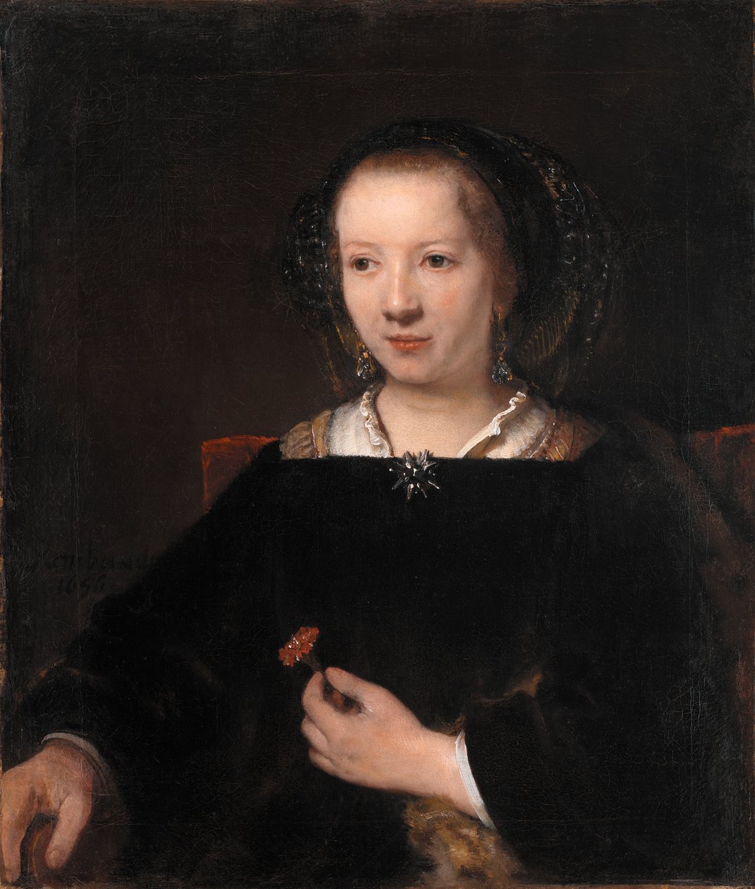 Giovane donna con un garofano da Willem Drost