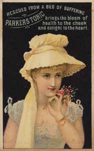 Bella signora che annusa i fiori