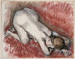 Donna nuda inginocchiata