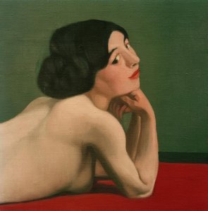 Nudo sdraiato sul tappeto rosso