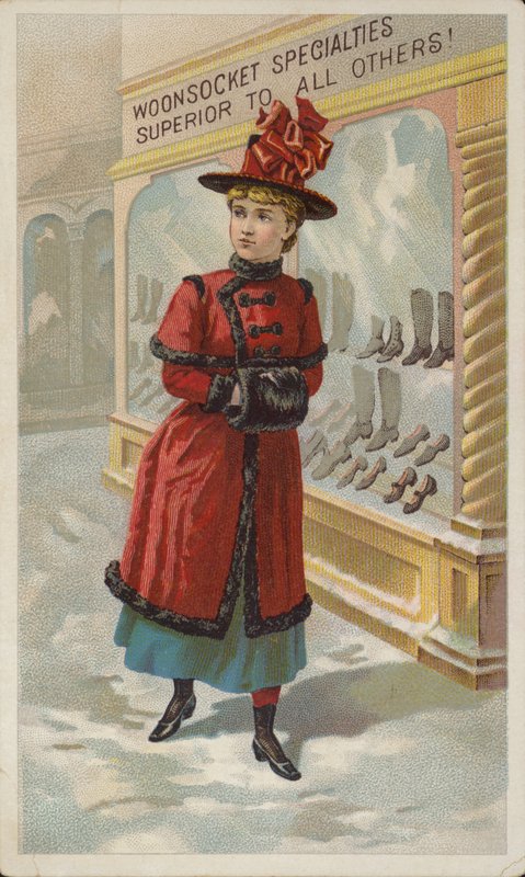 Signora che fa shopping in vetrina nella neve da American School